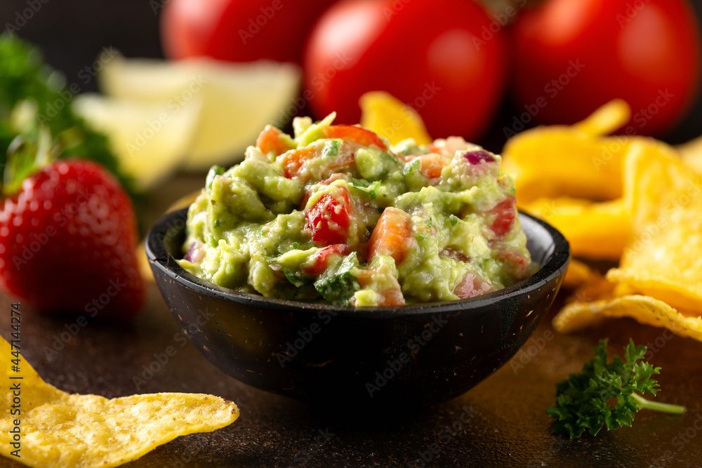 Strawberry and avocado guacamole, salsa with crispy tortilla chips