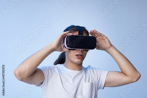 Young man using virtual reality headset. VR gadgets
