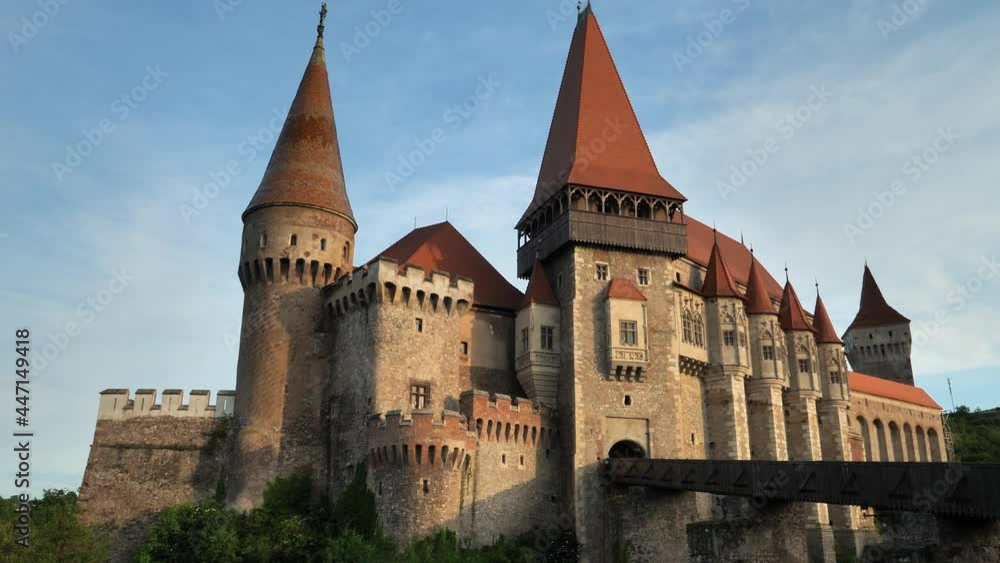 UNEDOARA, ROMANIA - JULY 22 2021: Corvin castle at sunset UNEDOARA, ROMANIA - JULY 22 2021: Corvin castle at sunset