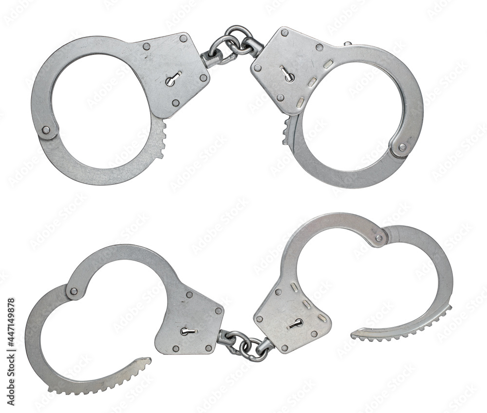 Metal open and closed handcuffs isolated on white Metal open and closed handcuffs isolated on white