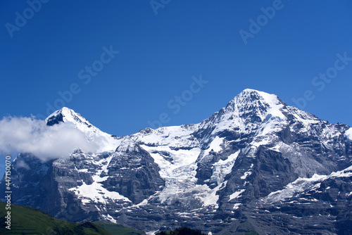 Jungfraujoch with research station Sphinx at Bernese highland on a sunny summer day with blue sky background. Photo taken July 20th, 2021, Lauterbrunnen, Switzerland. © Michael Derrer Fuchs