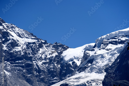 Jungfraujoch with research station Sphinx at Bernese highland on a sunny summer day with blue sky background. Photo taken July 20th, 2021, Lauterbrunnen, Switzerland.