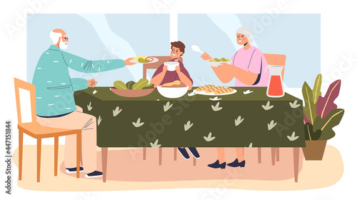 Dinner at grandparents house: kid boy eating meal sitting at table with grandmother and grandfather