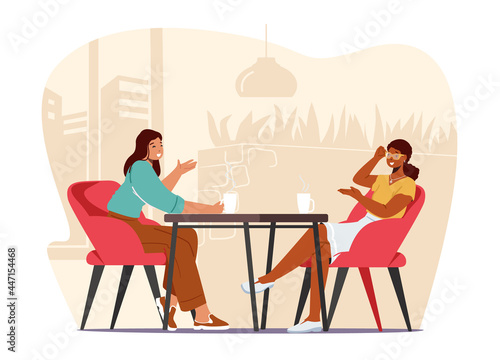 Young Pretty Girls Sitting in Cafe Chatting, Telling Gossip and News to Each Other, Girlfriends Meeting and Spare Time