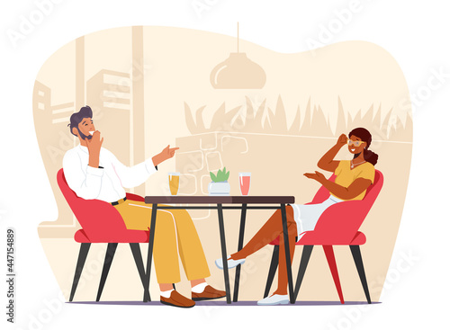 Young Happy Couple Dating, Meeting Sitting at Table in Cafe. People Drinking Coffee, Talking and Laughing in Restaurant