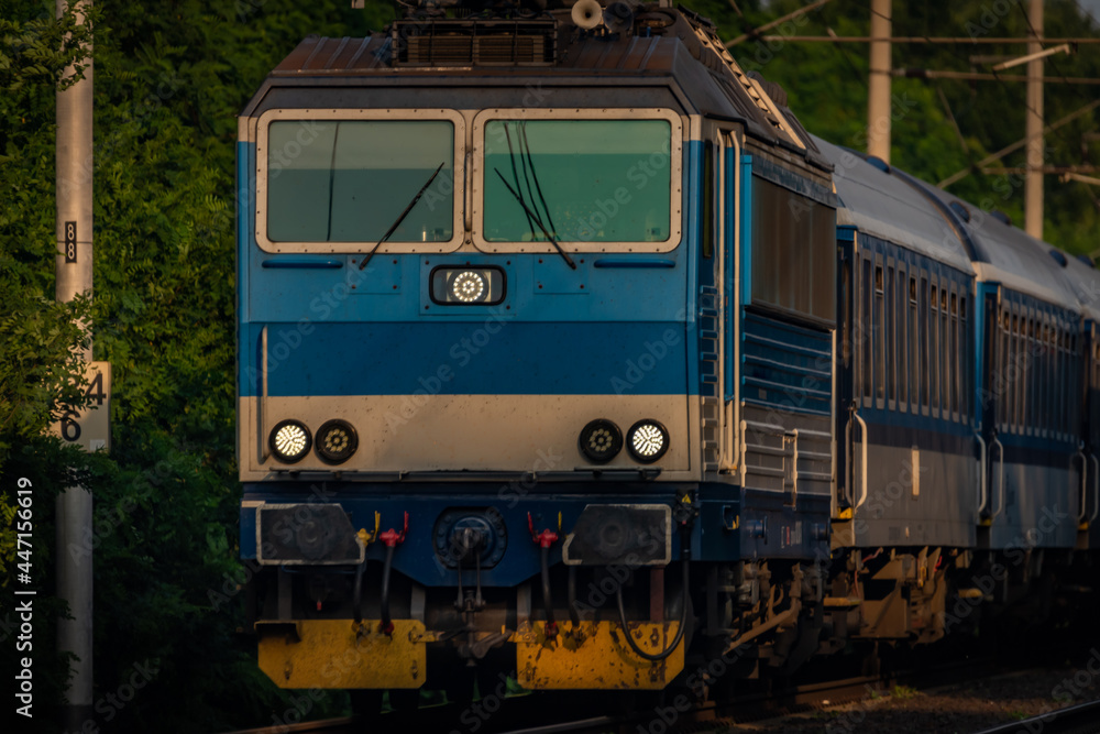 Trains and whistle stop Olesko in central Bohemia in sunset orange evening Trains and whistle stop Olesko in central Bohemia in sunset orange evening