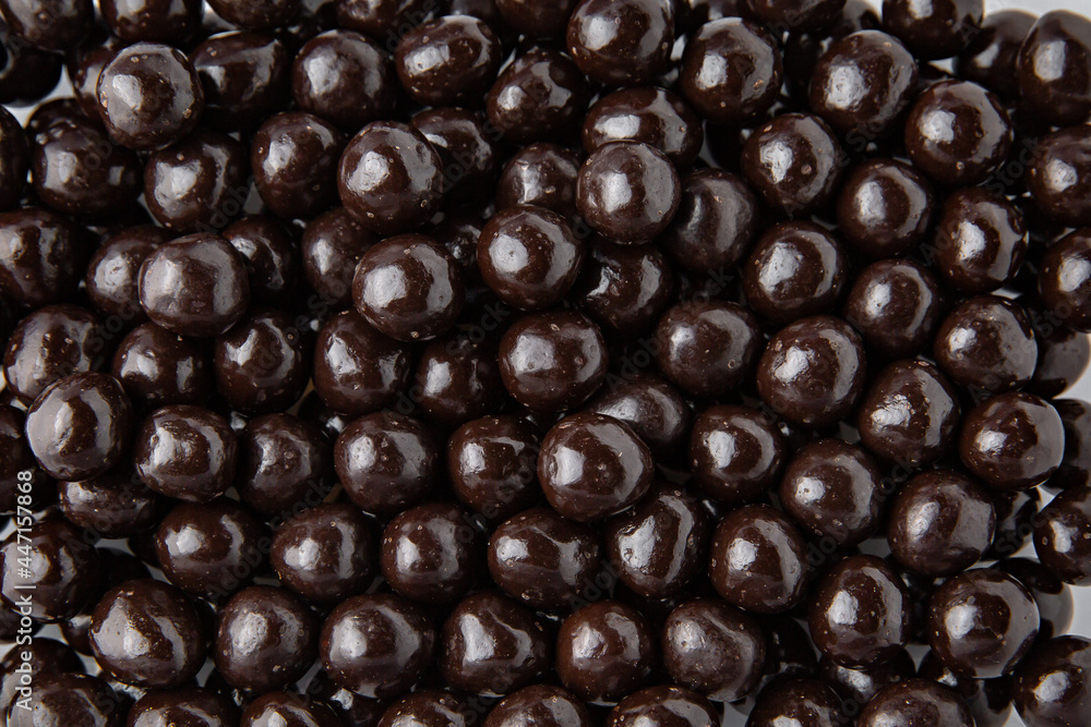 Hazelnuts in dark chocolate, dragees. Desserts for Candybar. Small round candies. Hazelnuts in dark chocolate, dragees. Desserts for Candybar. Small round candies.