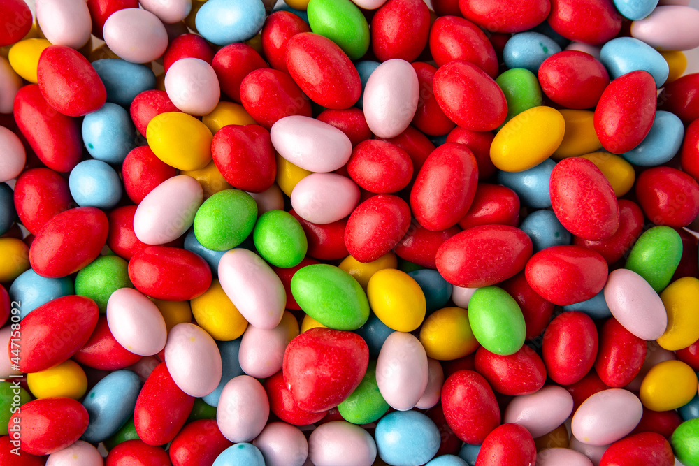 Candies. Glazed hazelnuts or almonds. Desserts for candy bars. Small multicolored dragees. Candies. Glazed hazelnuts or almonds. Desserts for candy bars. Small multicolored dragees.