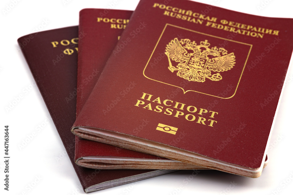 Passports of the Russian Federation are isolated on a white background. Close-up, Selective focus.