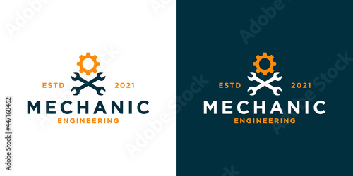 vintage mechanic workshop logo design with mechanic equipment for your business workshop etc