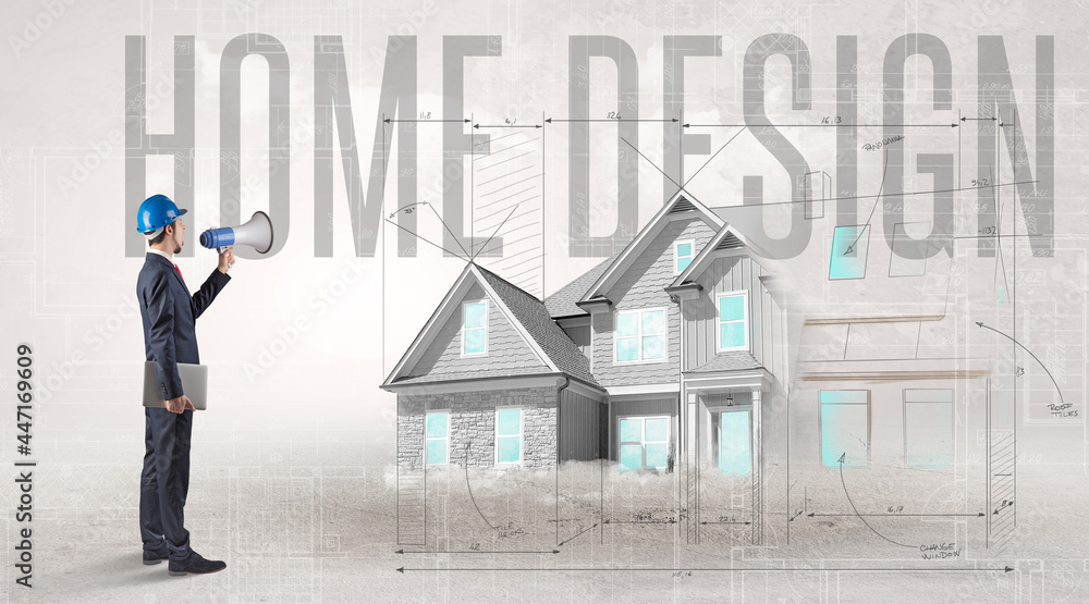 Young engineer holding blueprint