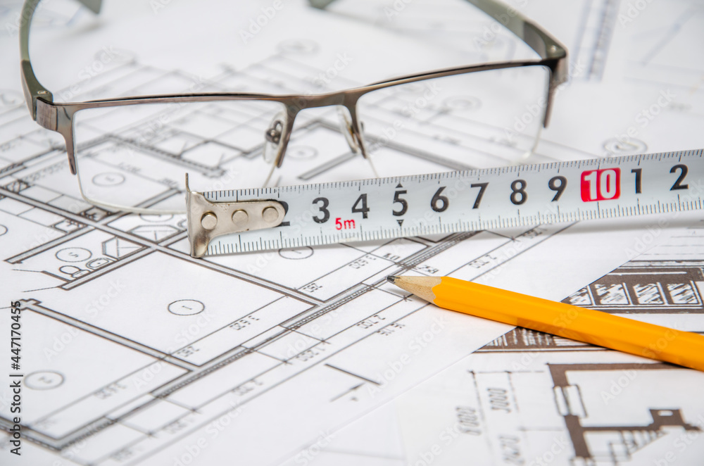Architectural project, ruler and pencil. Construction background. Architectural project, ruler and pencil. Construction background.