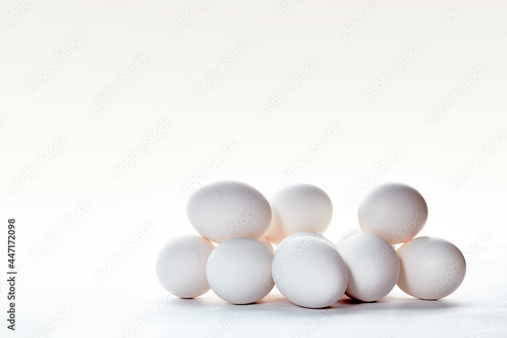 White eggs in white background, photo in high key White eggs in white background, photo in high key