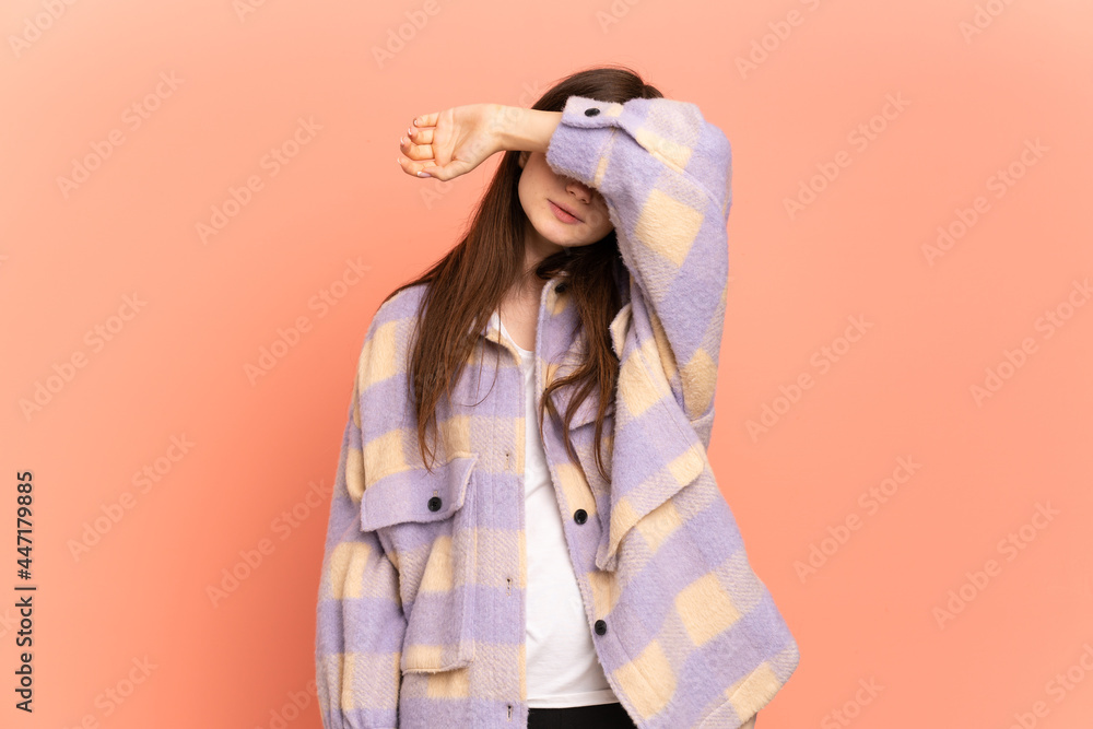 Young Ukrainian girl isolated on pink background covering eyes by hands Young Ukrainian girl isolated on pink background covering eyes by hands