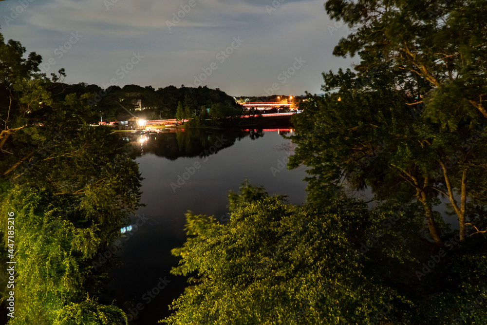 Night view of the Charles River in Newton PA near I-95