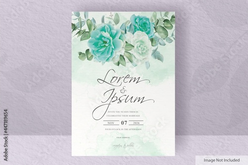 beautiful arrangement flower and eucalytus leaves wedding invitation card template photo