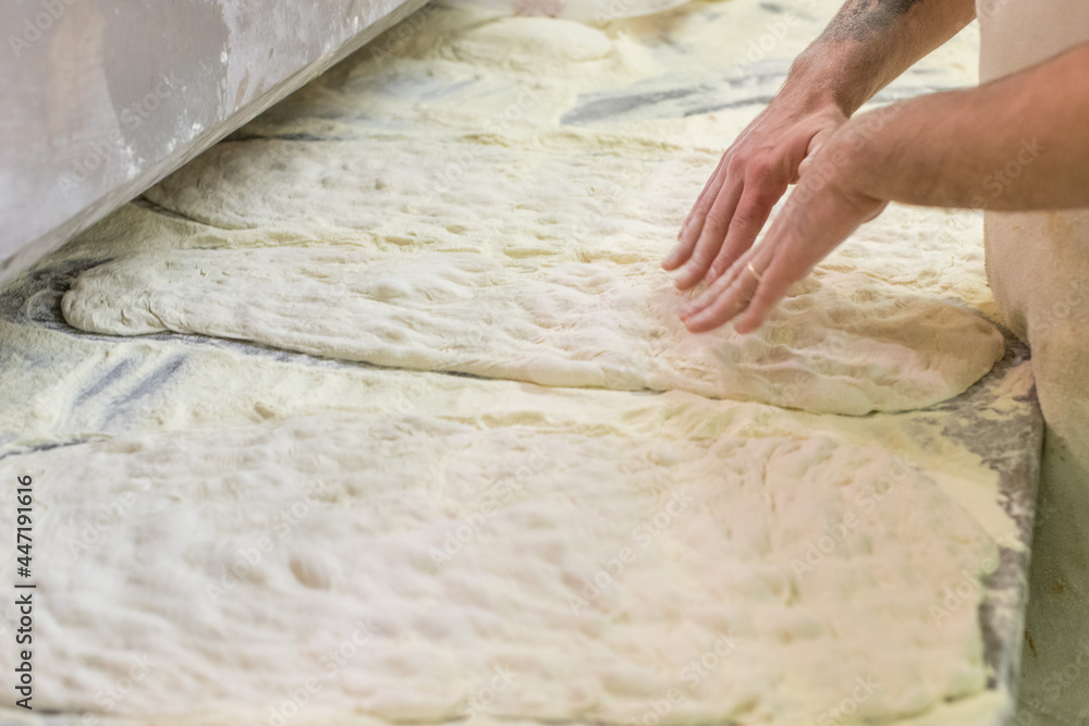 baker hands kneading dough baker hands kneading dough