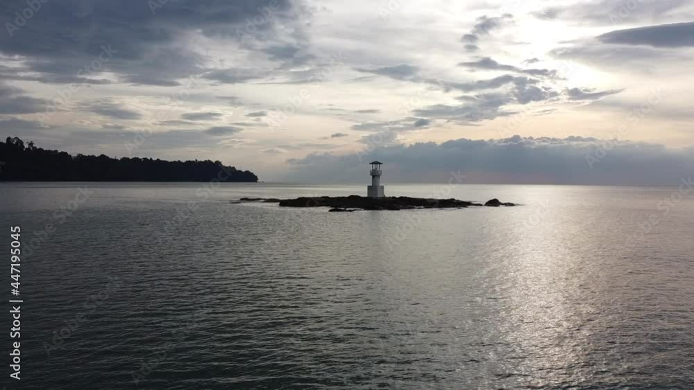 Aerial of lighthouse locate on the rock in the sea.
Aerial of lighthouse locate on the rock in the sea.