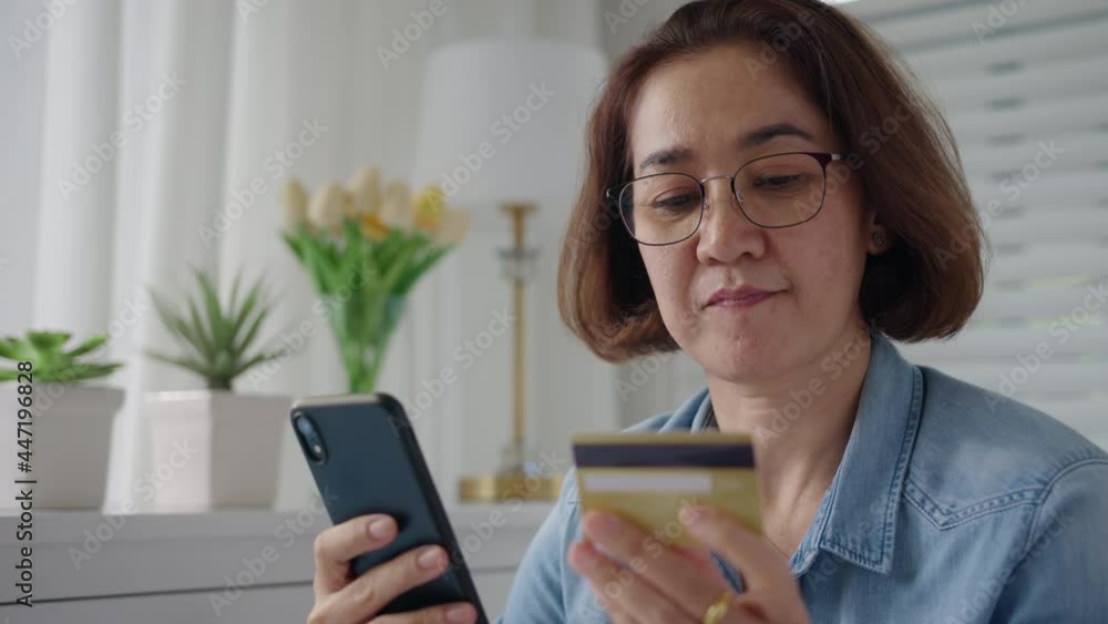 Asia hispanic senior people sit relax comfort smile at home sofa couch enjoy gift card typing wifi smart phone remotely buy on social media e-commerce retail shop store secure tech data omnichannel. Asia hispanic senior people sit relax comfort smile at home sofa couch enjoy gift card typing wifi smart phone remotely buy on social media e-commerce retail shop store secure tech data omnichannel.
