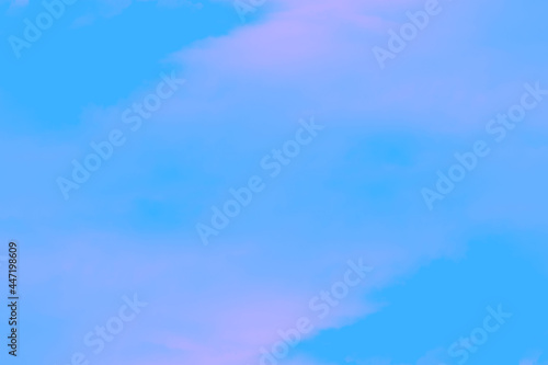 Foto Soft white clouds and blue pink  sky background.