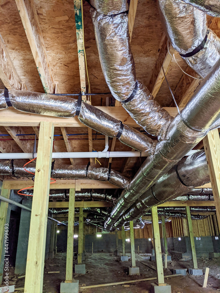 the art of hvac ductwork in a residential crawl space Stock Photo | Adobe  Stock