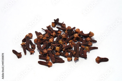 clove spices on a white background