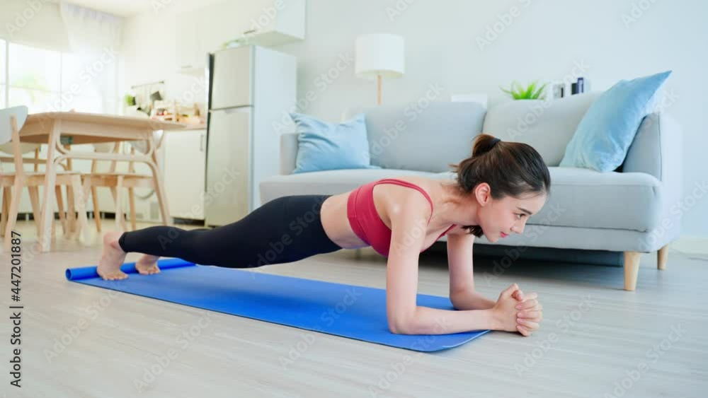 Asian Beautiful young woman stay home, doing cardio exercise at home. Asian Beautiful young woman stay home, doing cardio exercise at home.