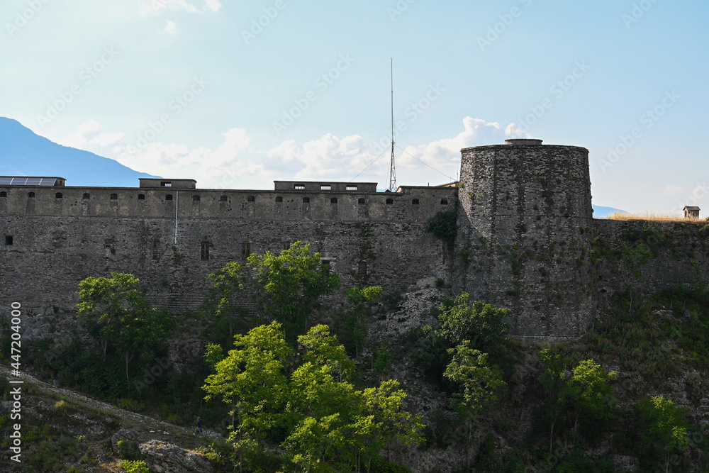 Castle wall of Kalaja e Gjirokastres Castle of Gjirokastra in Albania under a blue sky in summer