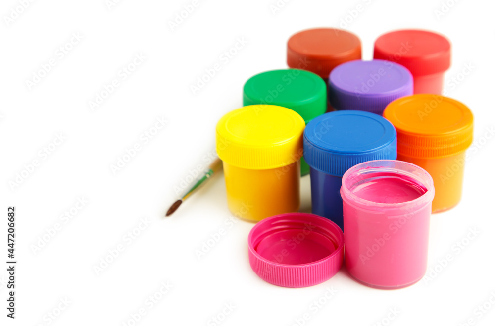 Set of colorful gouache jars isolated on white background. With copy space. Set of colorful gouache jars isolated on white background. With copy space.