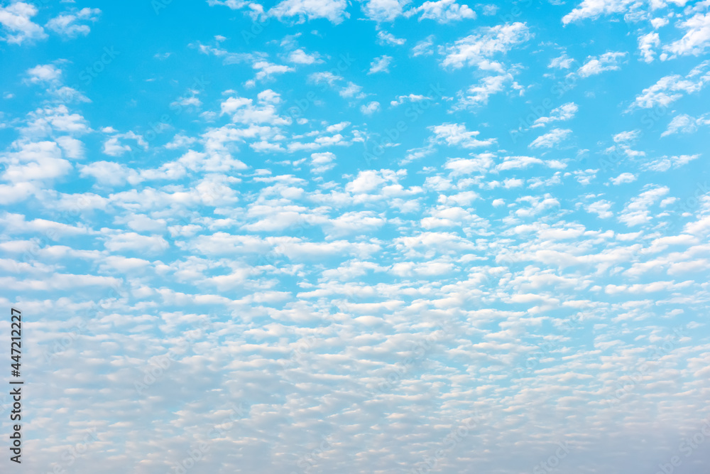 Cirrus clouds on the blue sky