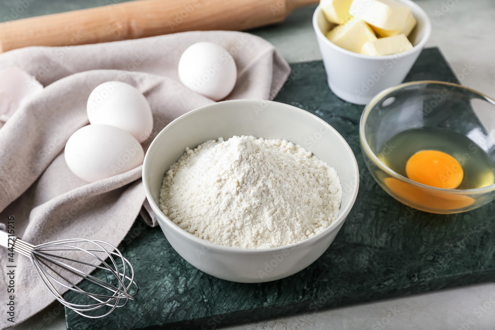 Ingredients for preparing bakery and utensils on light background Ingredients for preparing bakery and utensils on light background
