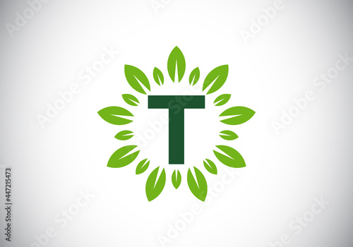 Initial T monogram letter alphabet with leaf wreath. Green leaf, flower logo design concept. Modern vector logo design for business, and company identity.