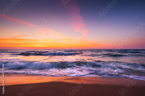 Beach sunrise over the sea