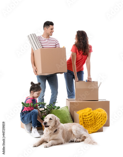 Happy family with dog and b...