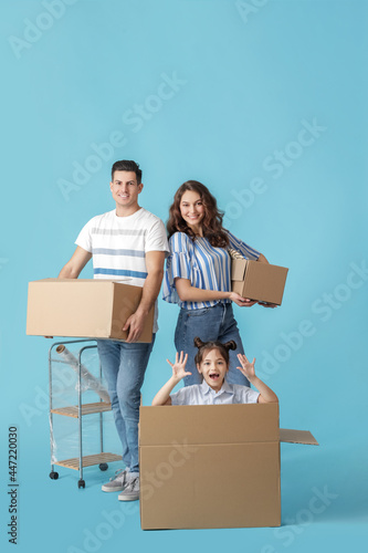 Happy family with moving bo...