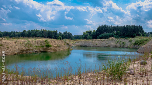 Gravel pit. A lake that fills the former pits with water.