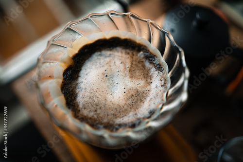 drip coffee in house,Pouring a hot water over a drip coffee