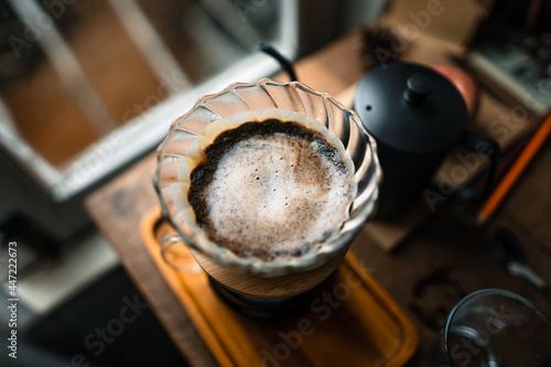 drip coffee in house,Pouring a hot water over a drip coffee