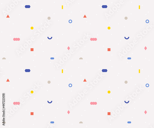 Small pieces of shapes are scattered and form a pattern.