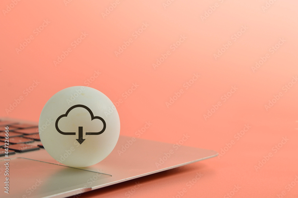 Laptop with cloud computing download symbol. Copy space - obrazy, fototapety, plakaty 
