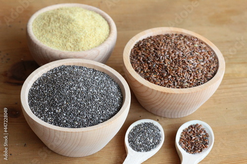 LInseed and chia seeds in wooden bowls
