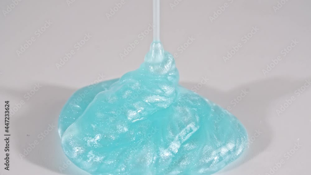 Pouring Transparent Blue Cosmetic Gel Cream With Molecule Bubbles. Macro Shot. High quality 4k footage Pouring Transparent Blue Cosmetic Gel Cream With Molecule Bubbles. Macro Shot. High quality 4k footage