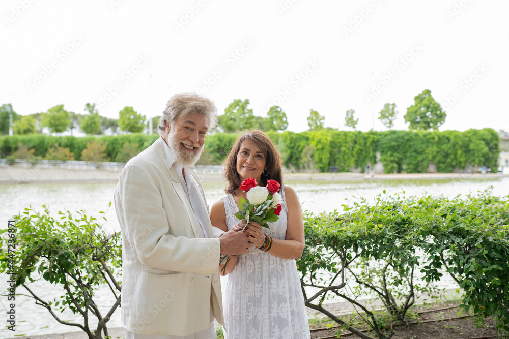 senior couple getting married outdoors
