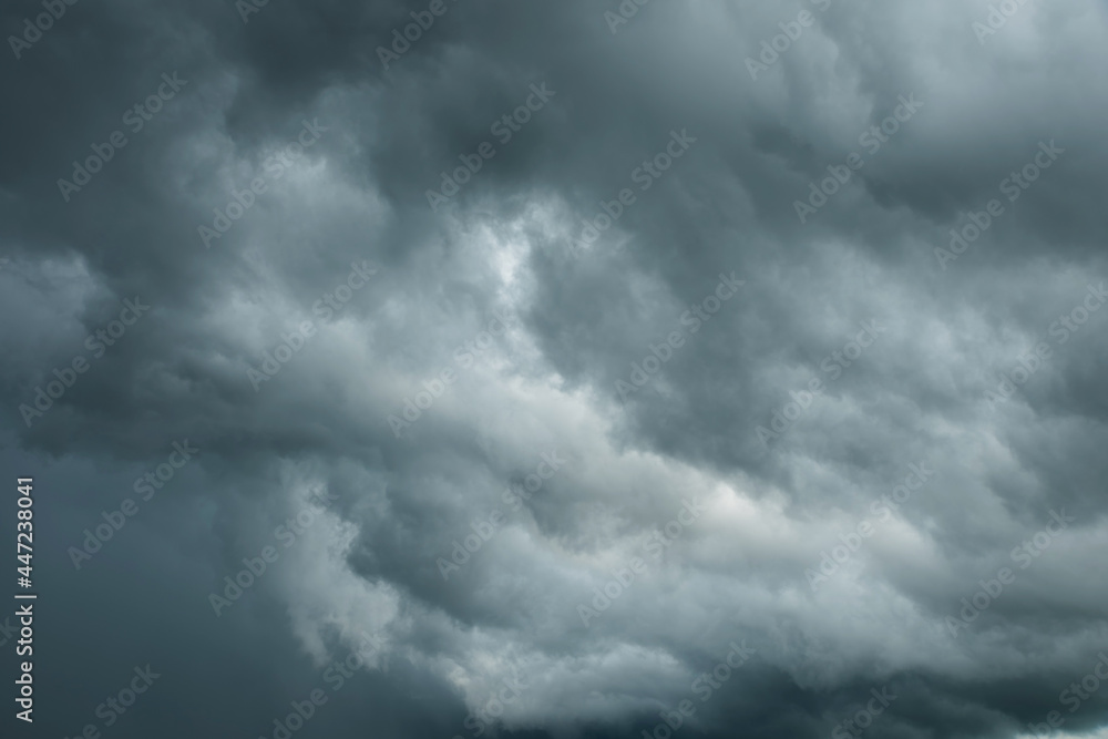 Close-up black strom clouds, Dark sky and dramatic storm clouds before rainy, Bad weather with precipitation in rainy season Close-up black strom clouds, Dark sky and dramatic storm clouds before rainy, Bad weather with precipitation in rainy season