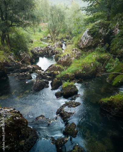 Rocks and cascades on wild stream Krupa on popular picnic place Krupa na Vrbasu near Banja Luka, Bosnia and Herzegovina