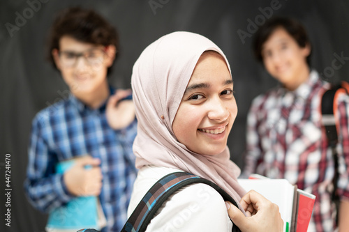 Group of multy ethnic kids in classroom space