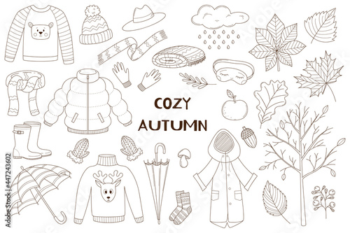 A set of decorative elements. Autumn, forest. Warm clothing, umbrella, mittens, rubber boots, leaves. Design collection of outline doodles. Black and white vector illustration. Isolated on white.