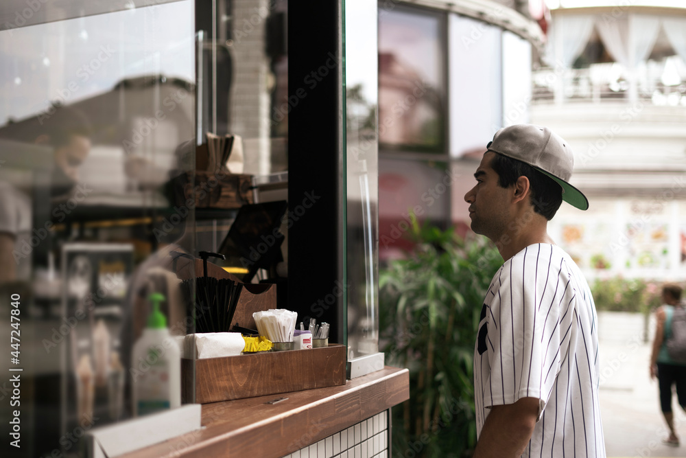 person buying food and coffee in city street cafe person buying food and coffee in city street cafe