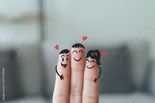 Closeup of Fingers With Happy Smiling Face, Friendship, Family, Group, Teamwork, Comunity, Unity, Love Concept. photo