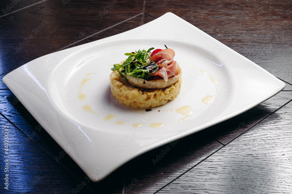 Risotto with Parma Ham, Rucola and camembert Cheese Risotto with Parma Ham, Rucola and camembert Cheese